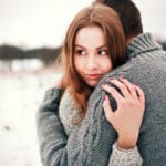 girl-on-guys-shoulder