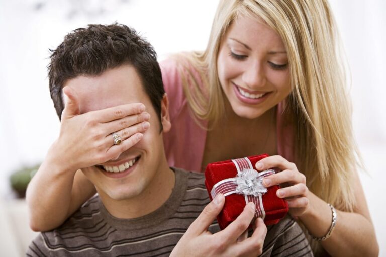 girl giving guy a gift